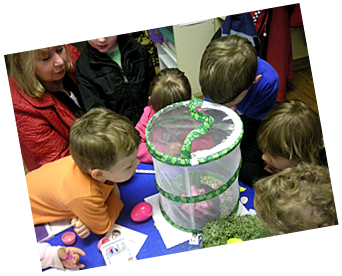 children around a cake